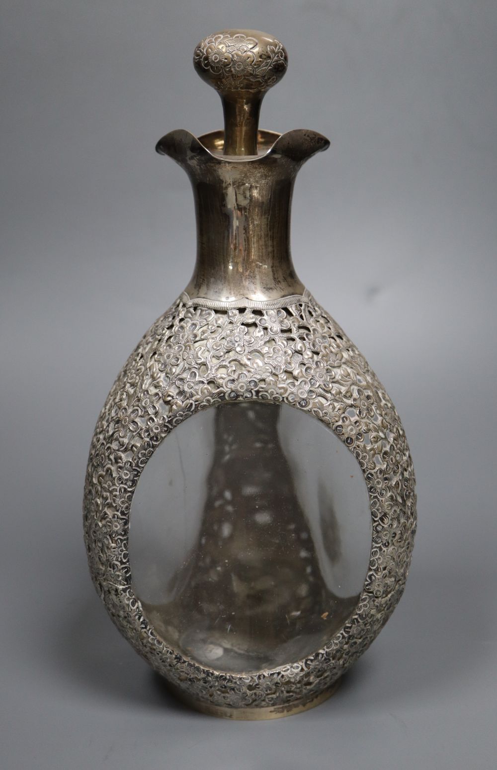A Hong Kong sterling mounted Haigs bottle decanter and stopper, overall 26cm.